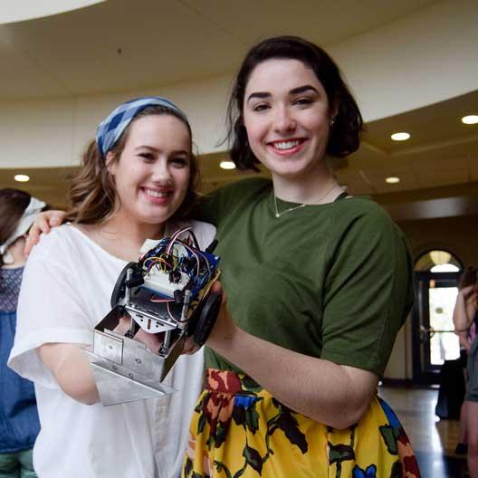 Students with their battle bot during Discovery Day