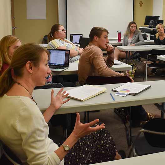 Students having a discussion in class